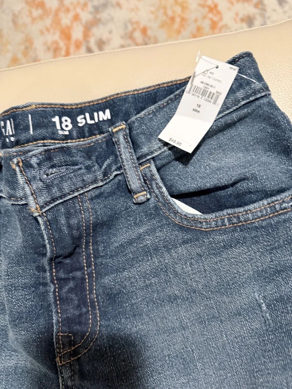 GAP Skinny Jeans in Faded Blue with Knee Distress